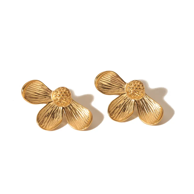 Aretes media flor