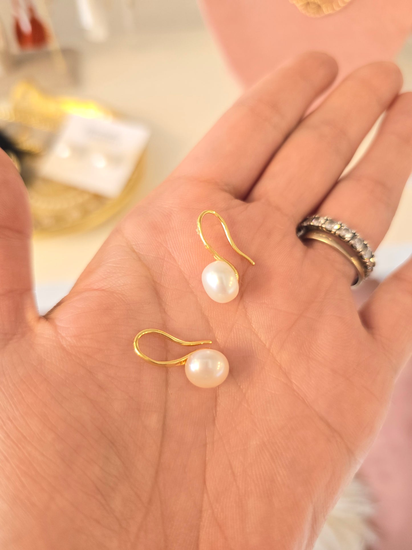 Aretes colgantes de perla