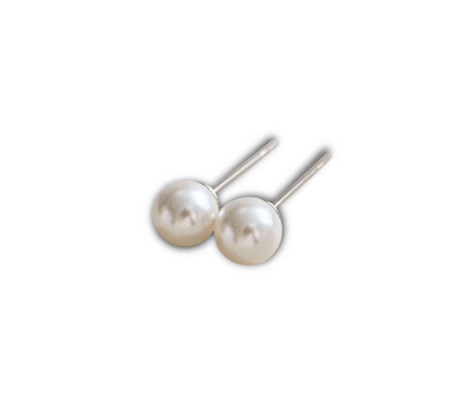 Broquel de perlas blancas